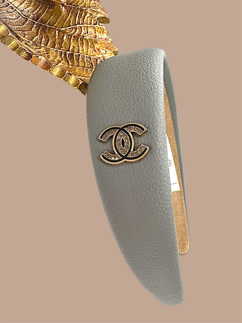 CHANNNEL Gray Padded Headband with Gold CC Crystal Logo